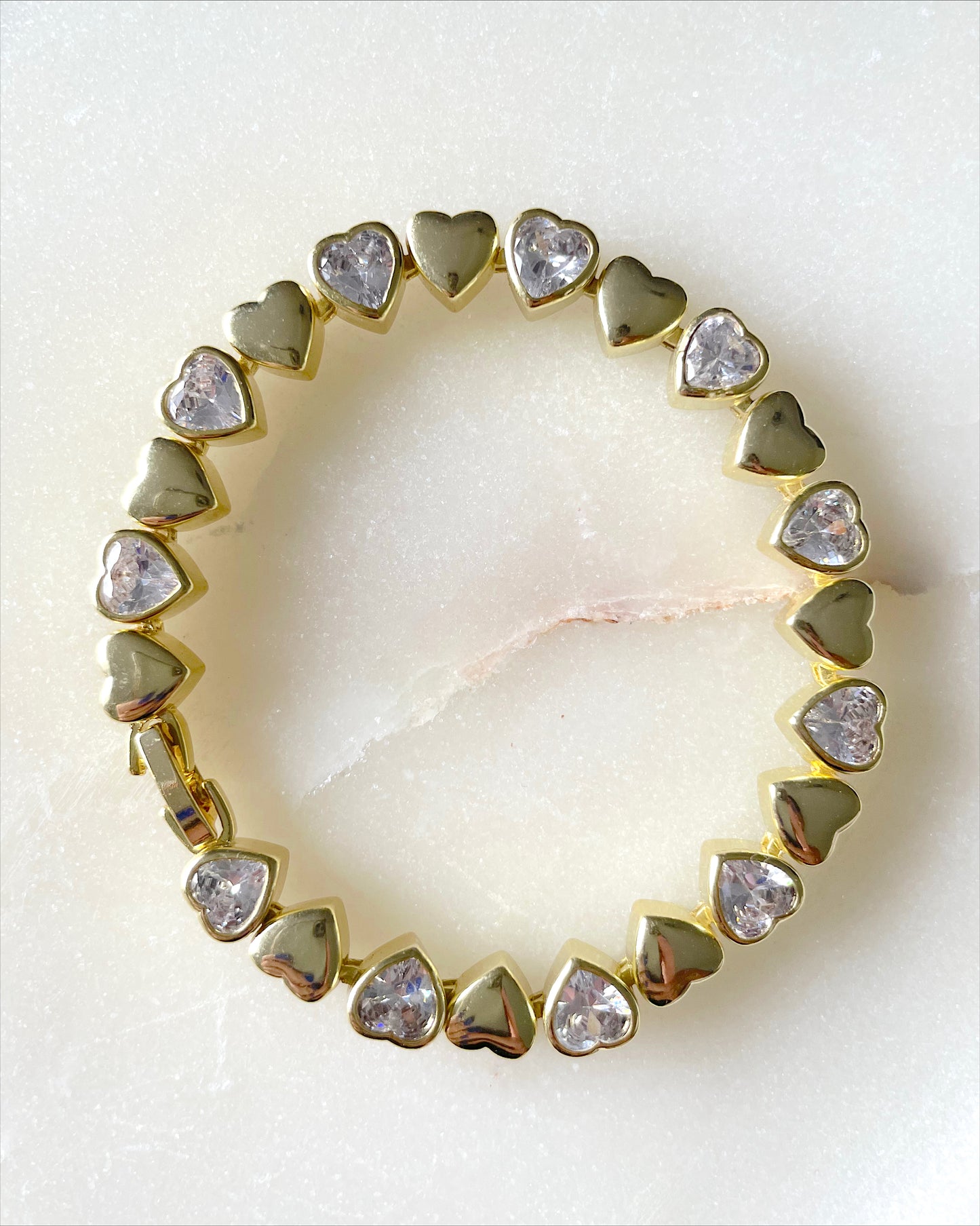 Pulsera de circonitas y oro.