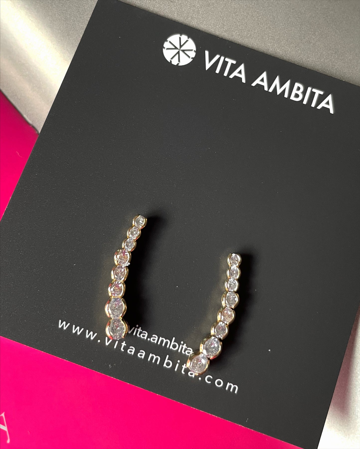 Boucles d'oreilles ligne de pierres précieuses claires