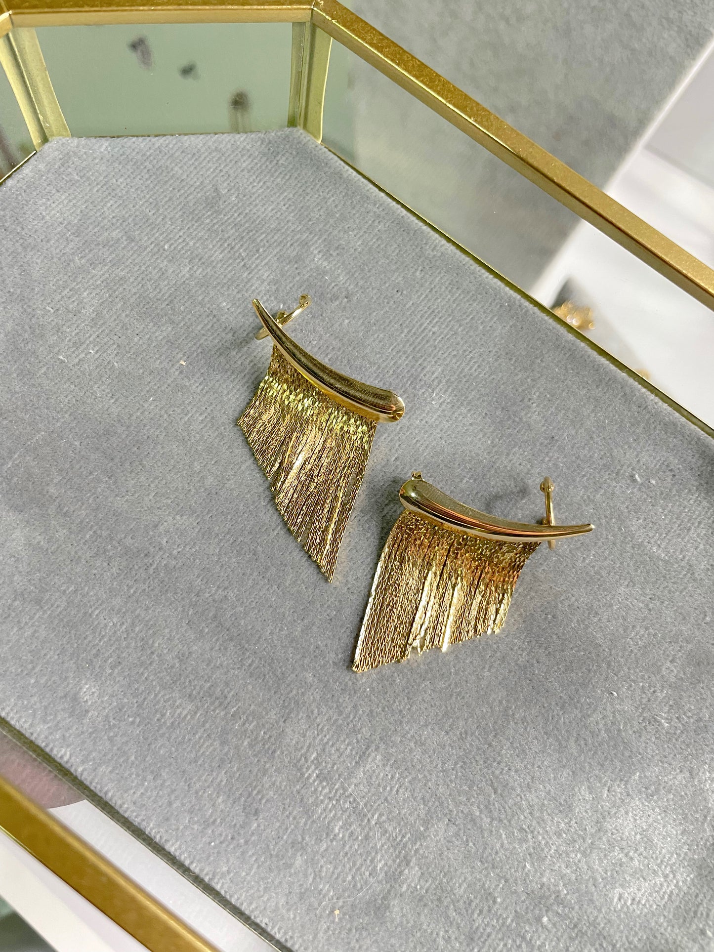 Pendientes de cuerno con borlas