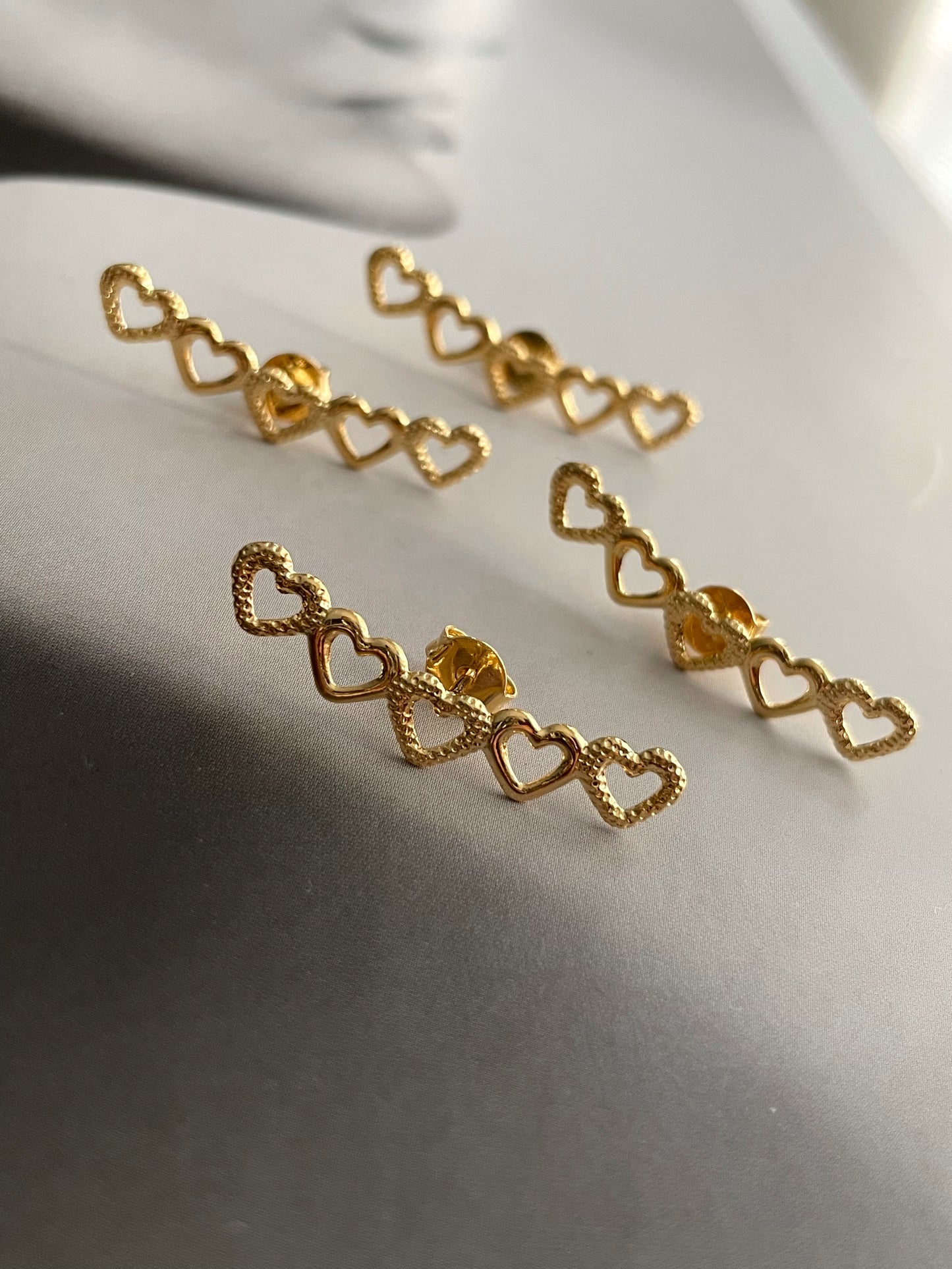 Lined hearts earrings