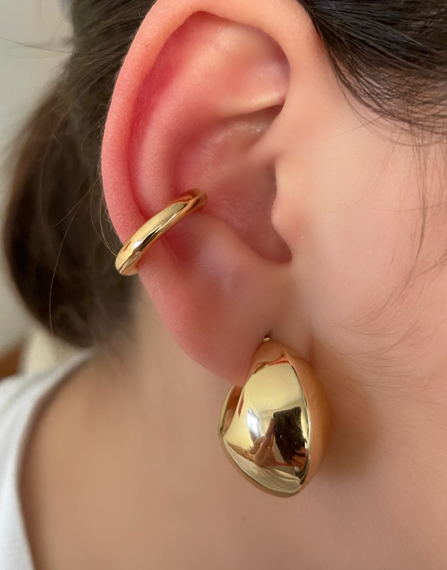 Boucle d'oreille ronde dorée