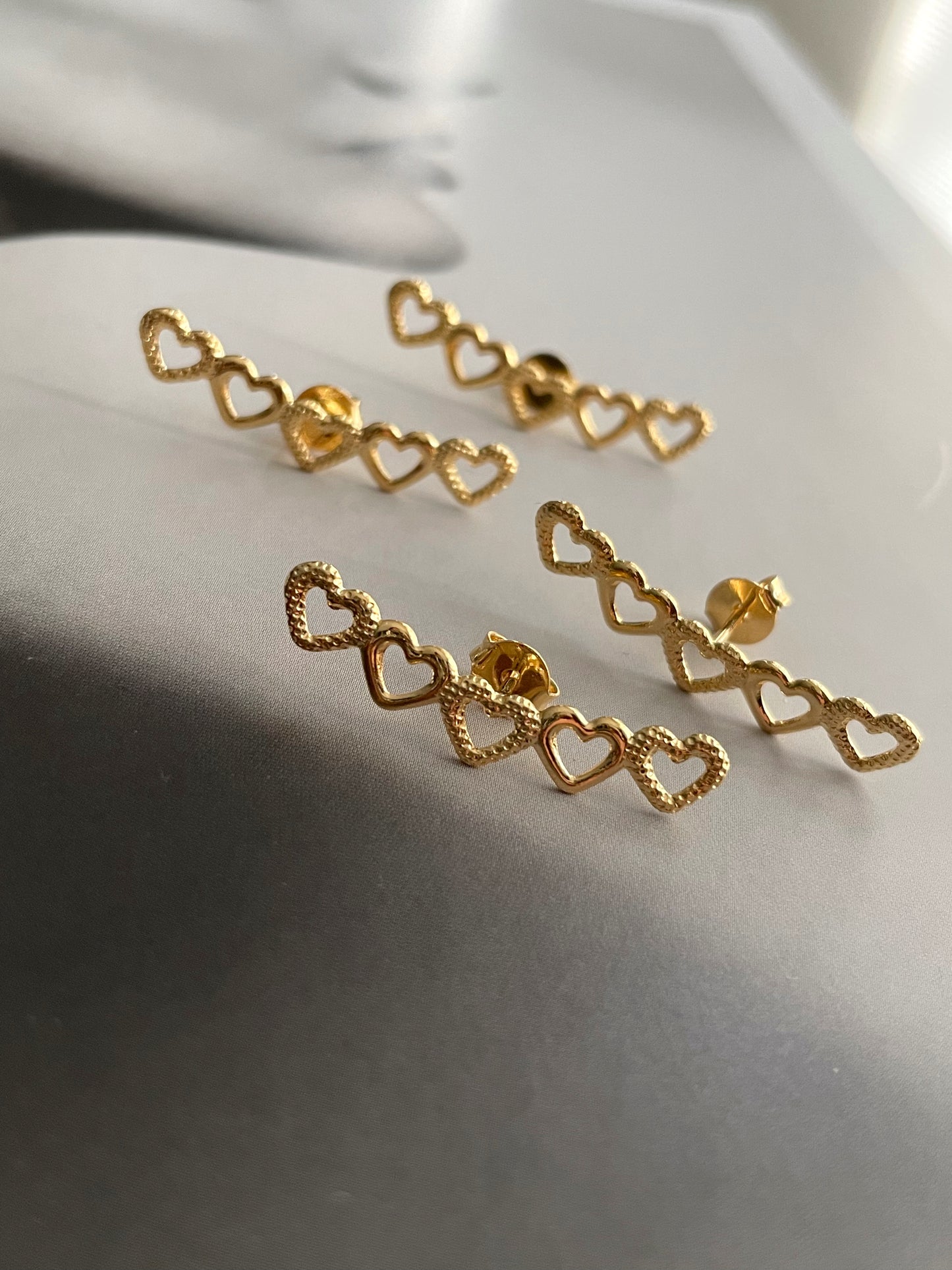 Lined hearts earrings