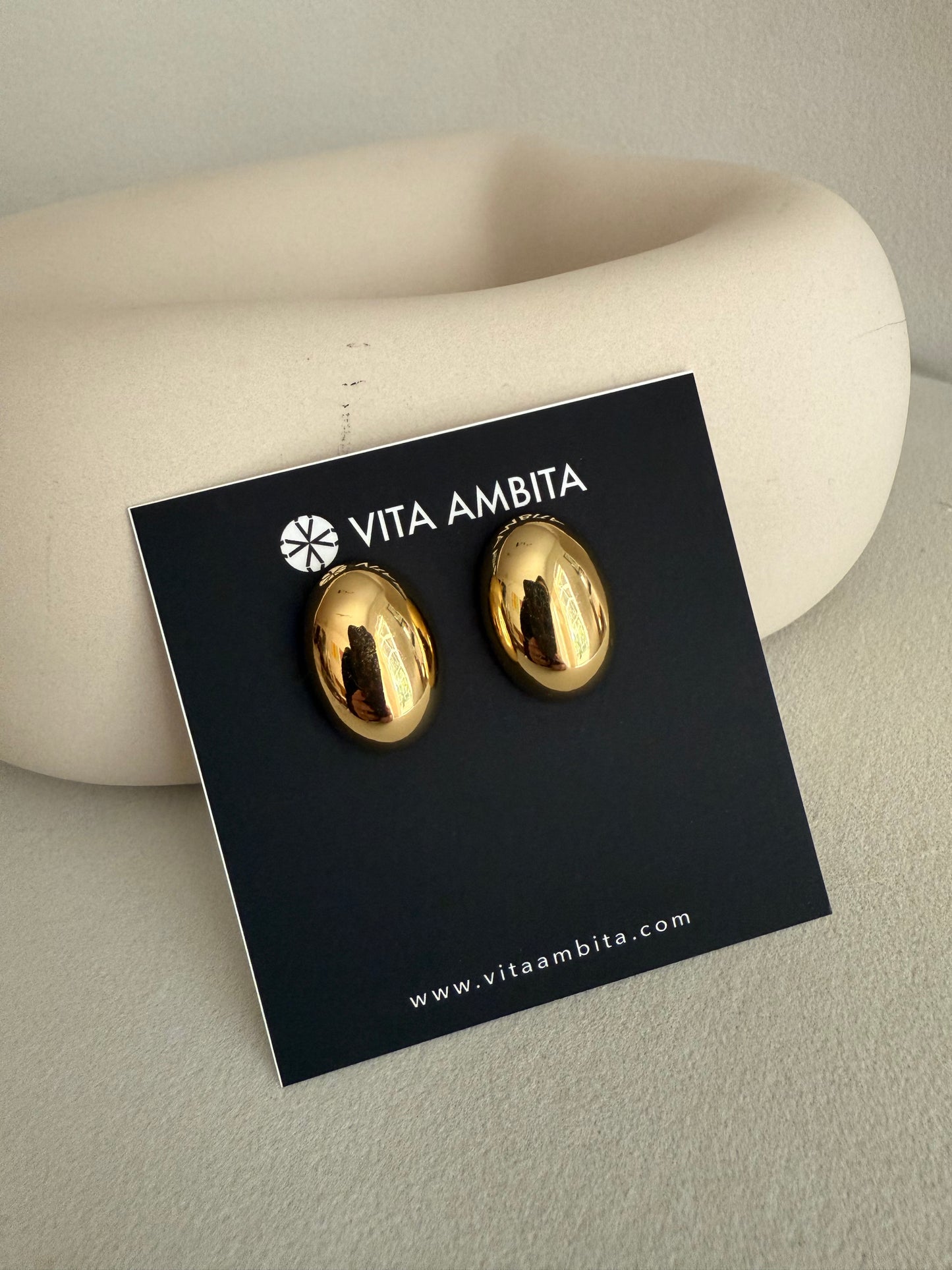 Pendientes redondos llamativos