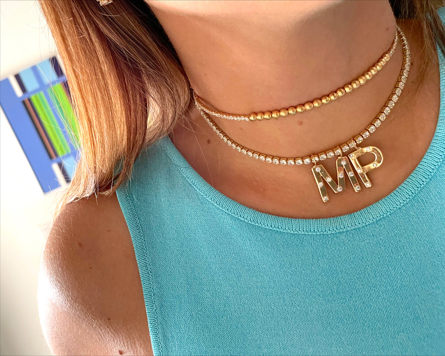 Tennis necklace with gold zirconia letters