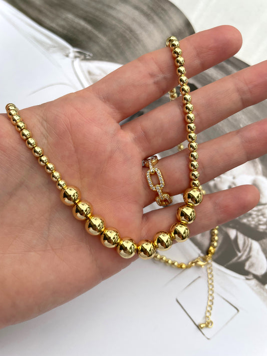 Collier de perles d'or