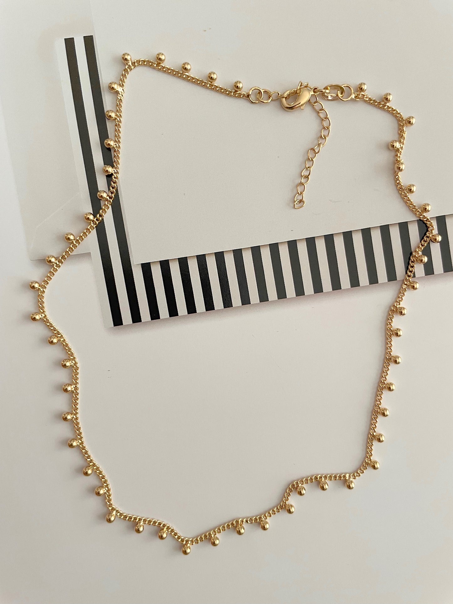 Dots gold necklace