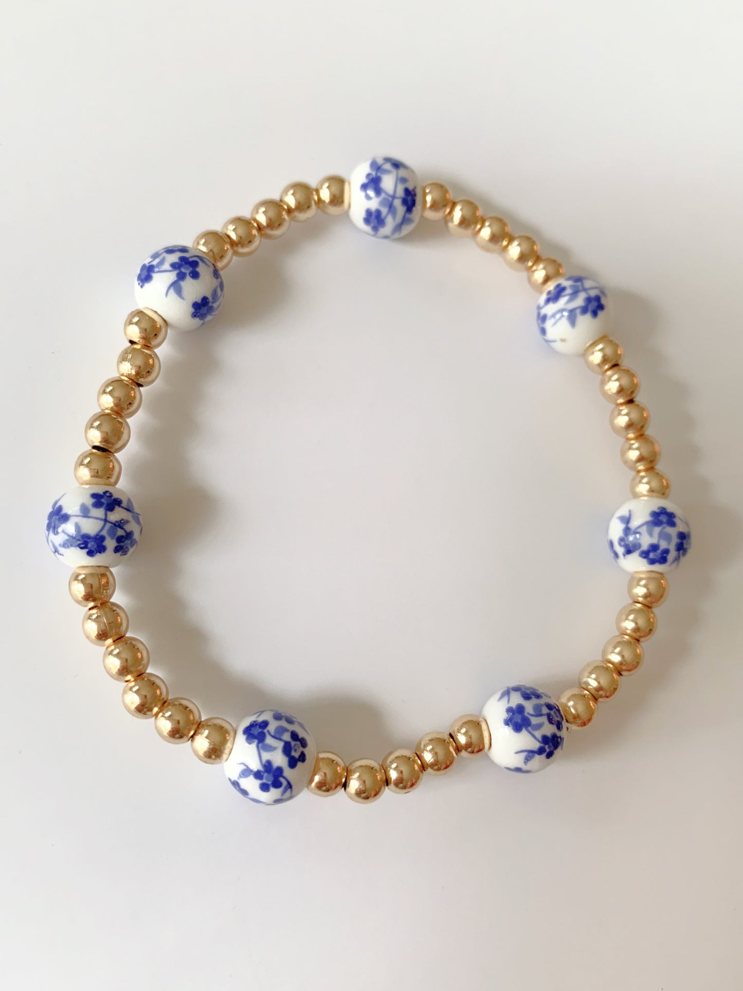 Blue Floral gold beaded bracelet