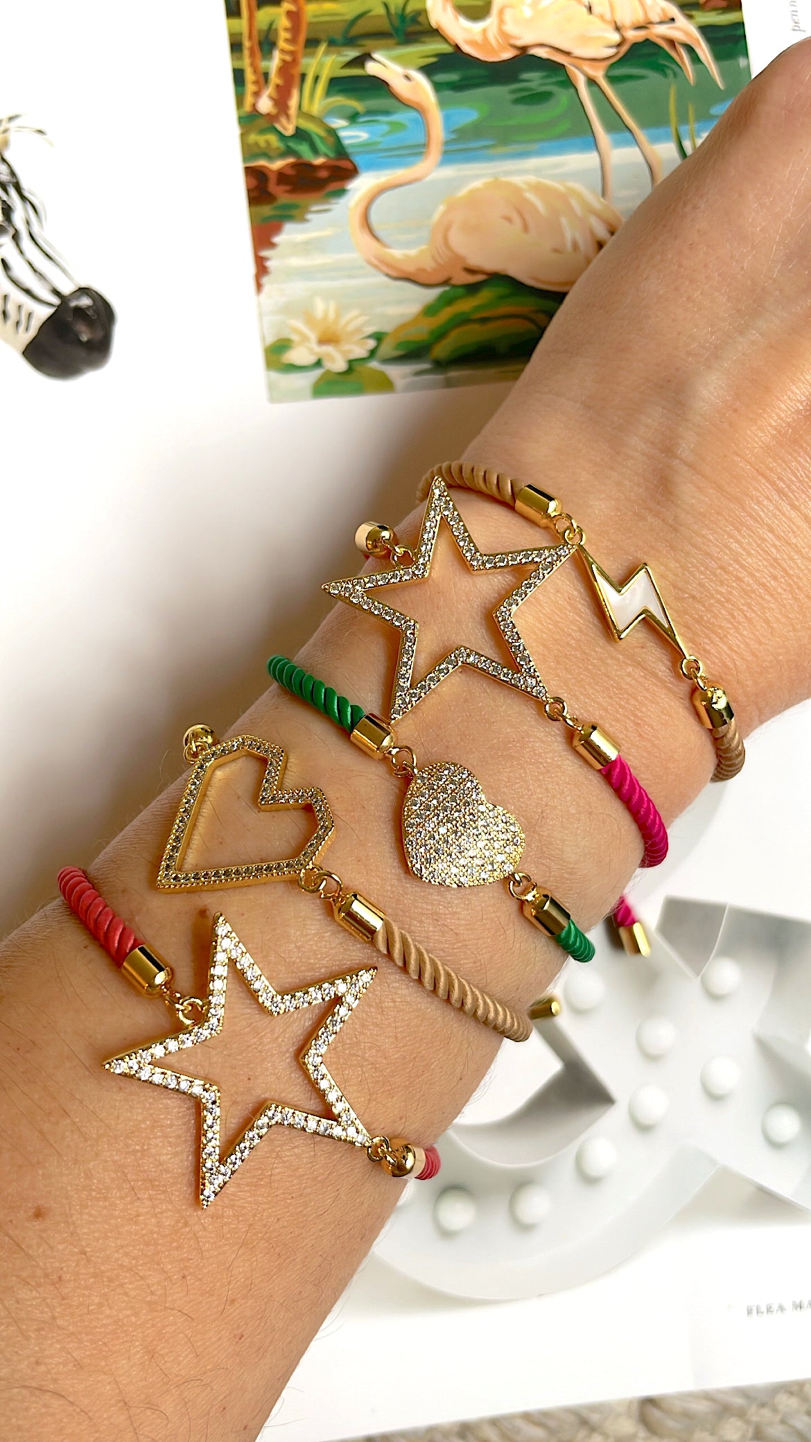 Charm with colored bracelets