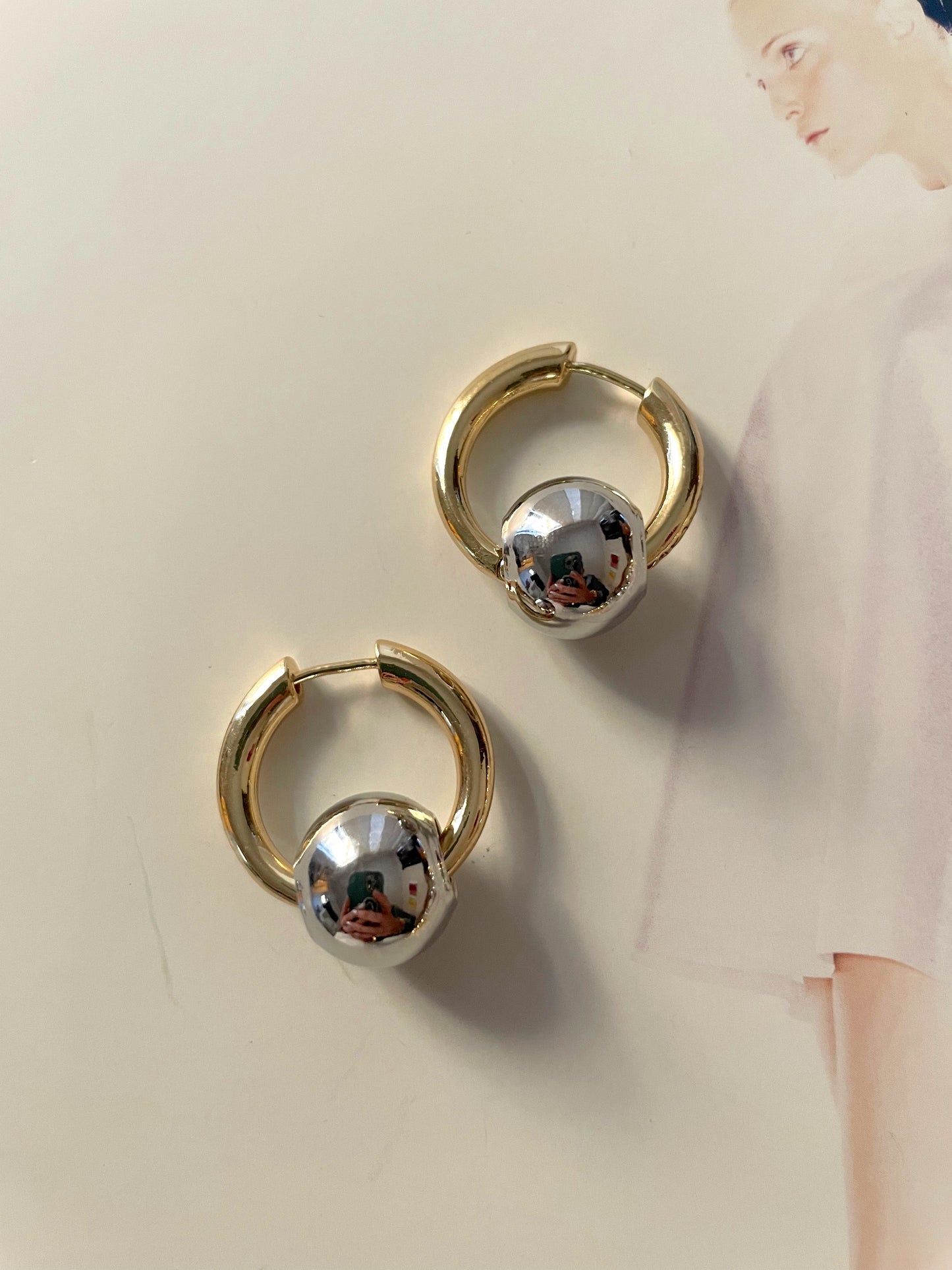 Globe hoops earrings