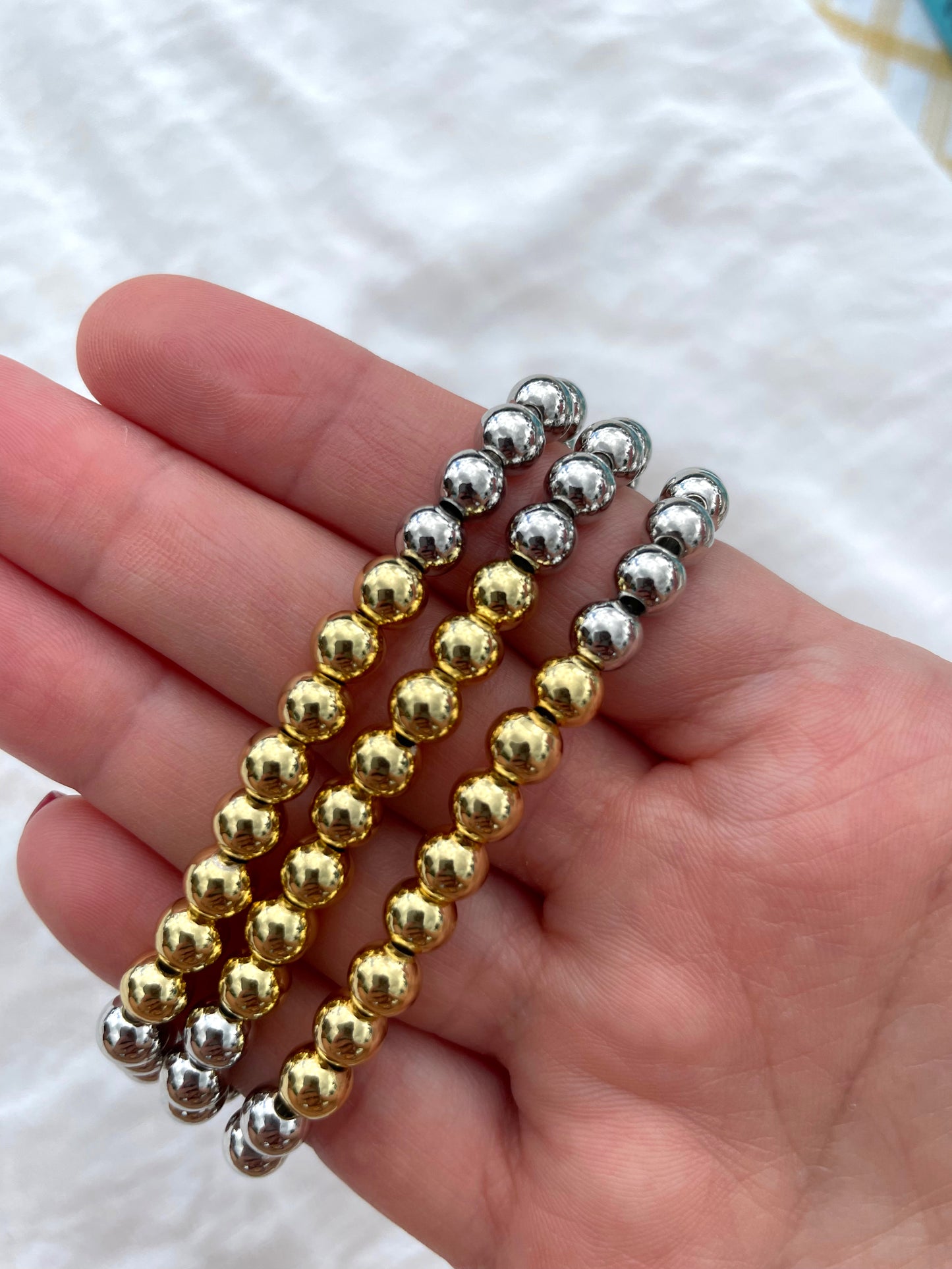 Bicolor gold beaded bracelets