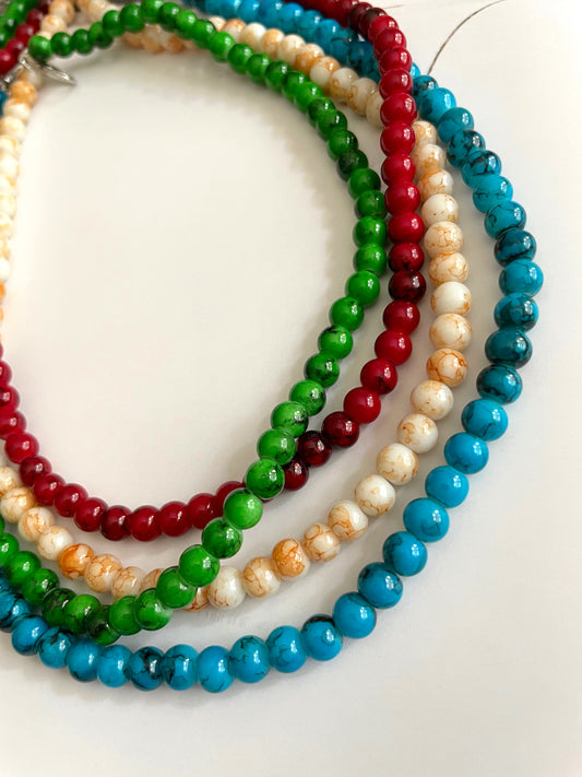 Colliers de perles de verre de couleur unie