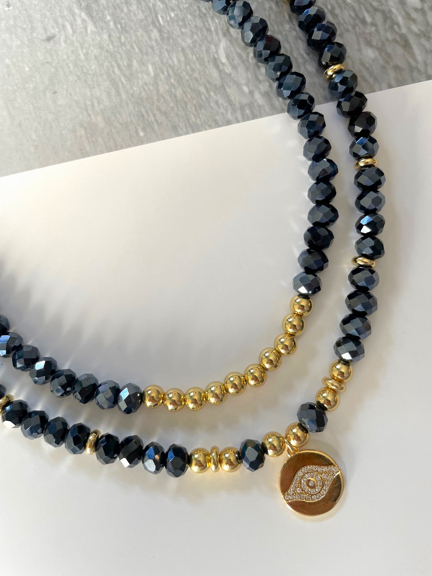 Crystals and gold plated beads necklaces