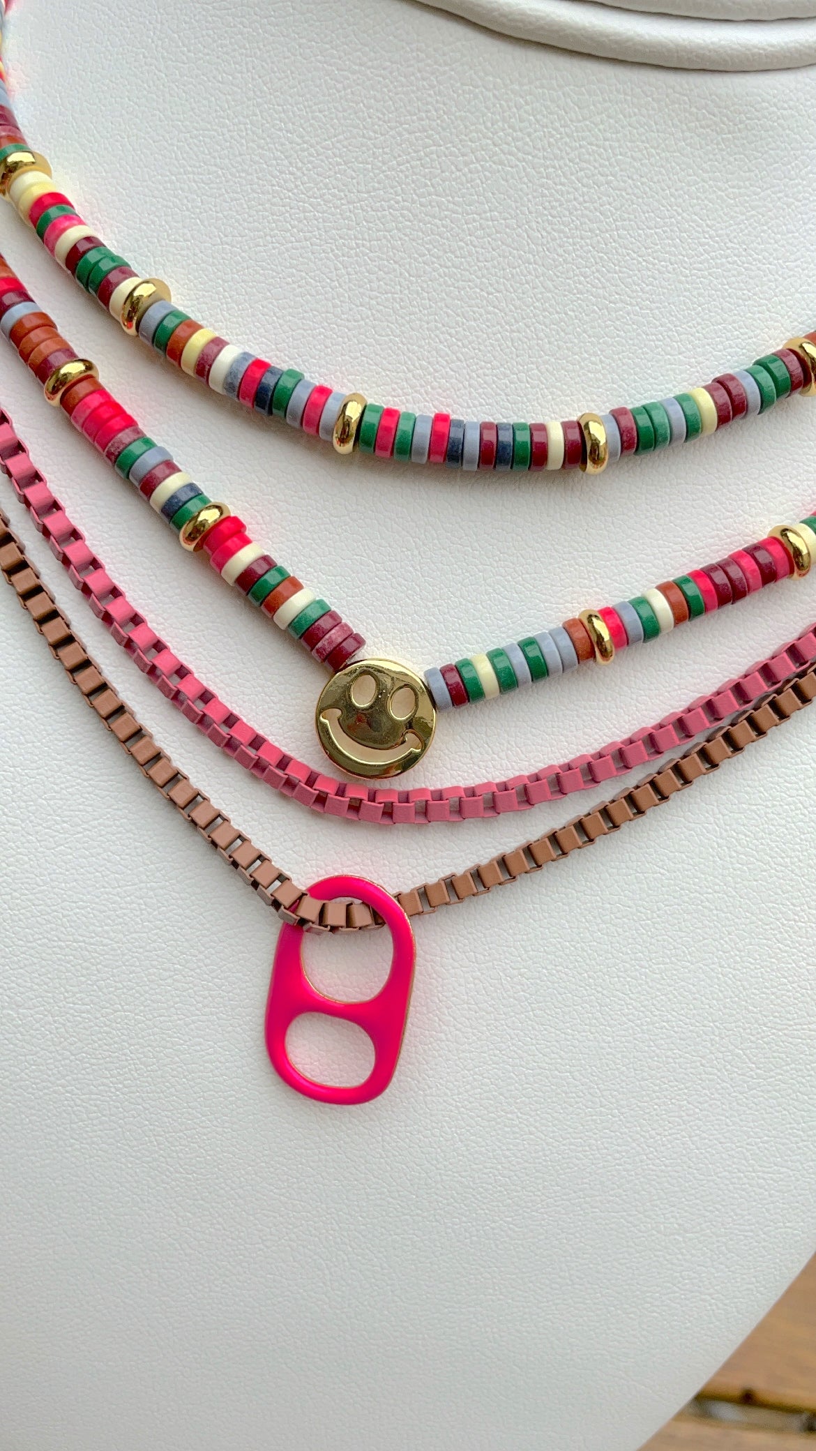 Multicolored puka necklace style