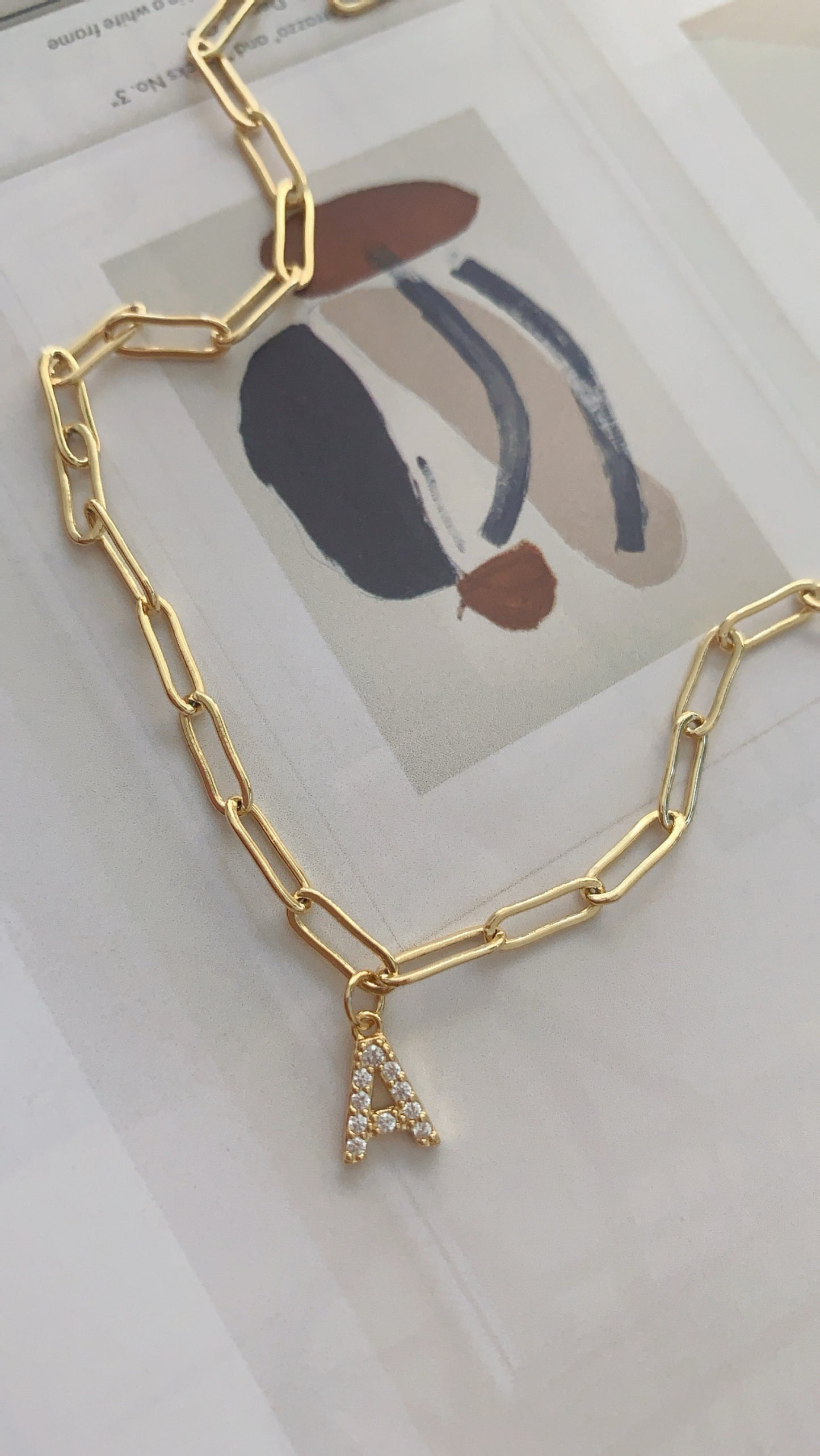 Paper clip link necklace + sparkling mini letter