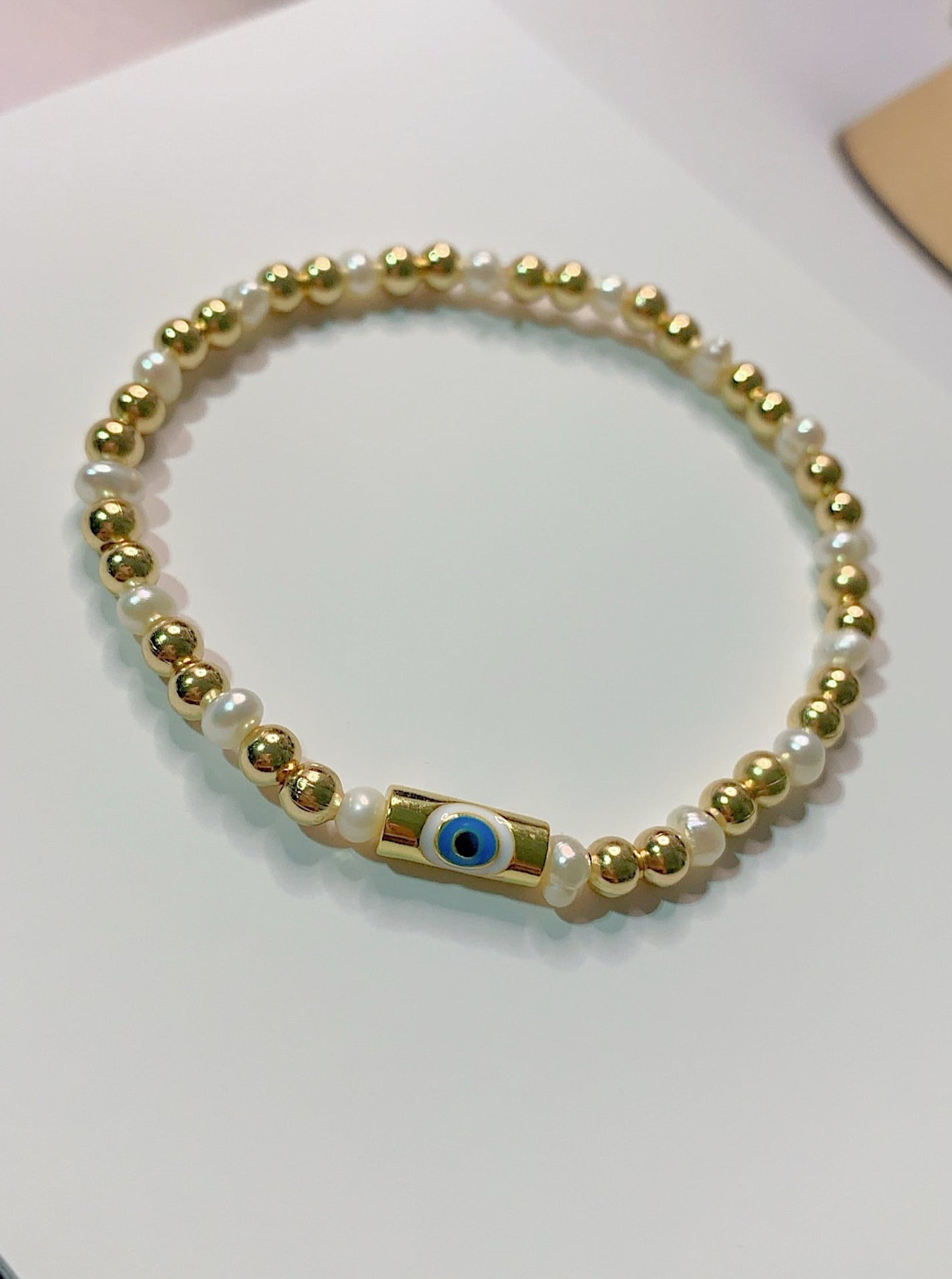 Pearls and Gold Evil Eye Bracelets – Vita Ambita