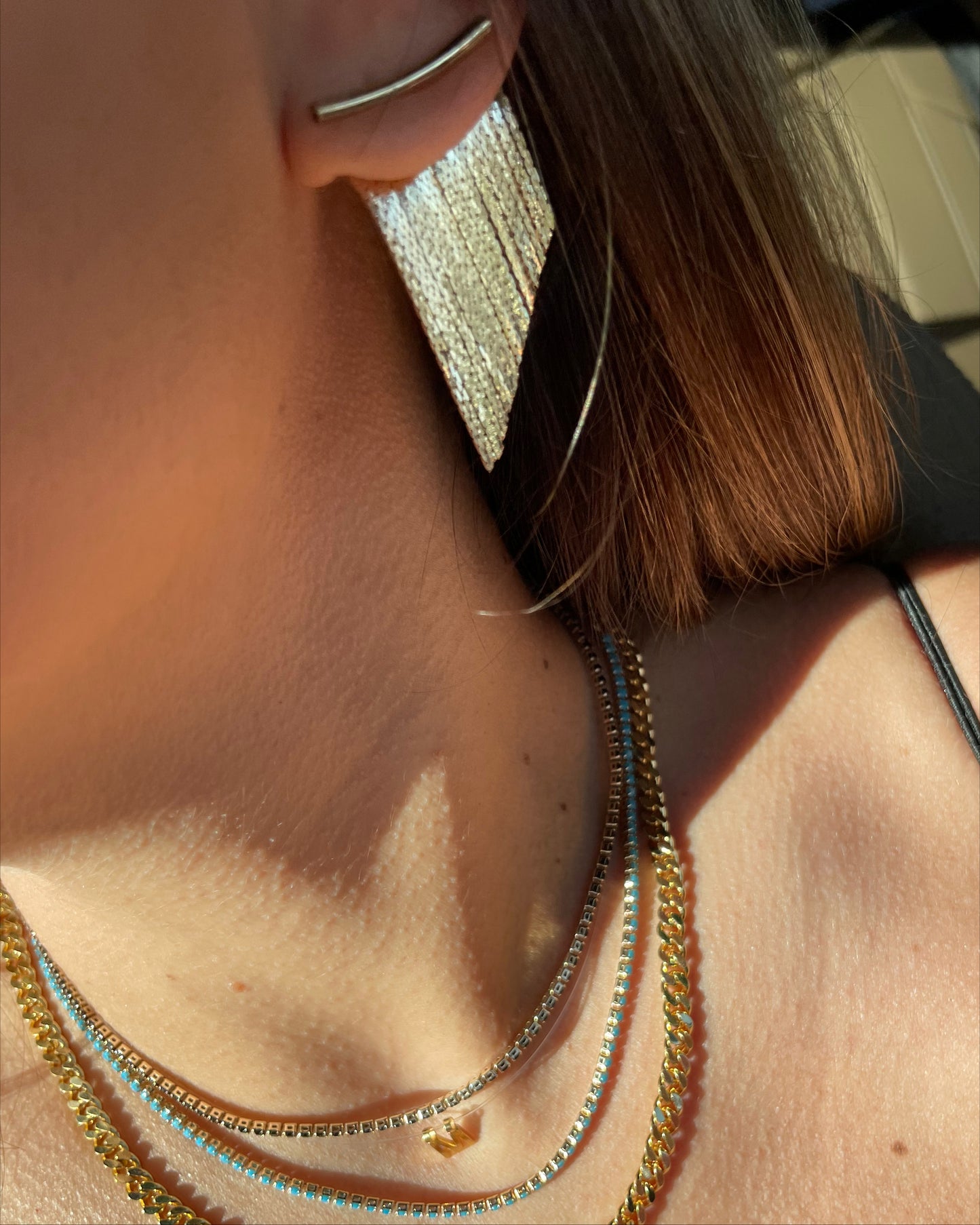 Golden tassel statement earrings