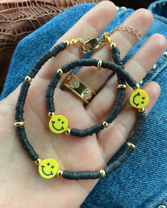 Happy face black rubber necklace