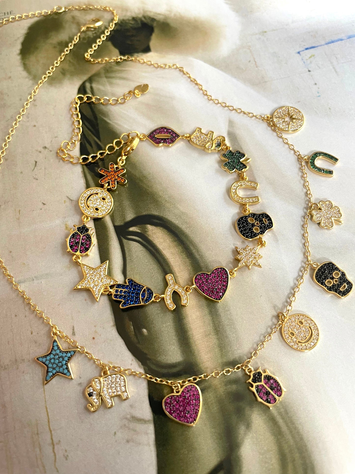Multi charms bracelets and necklace