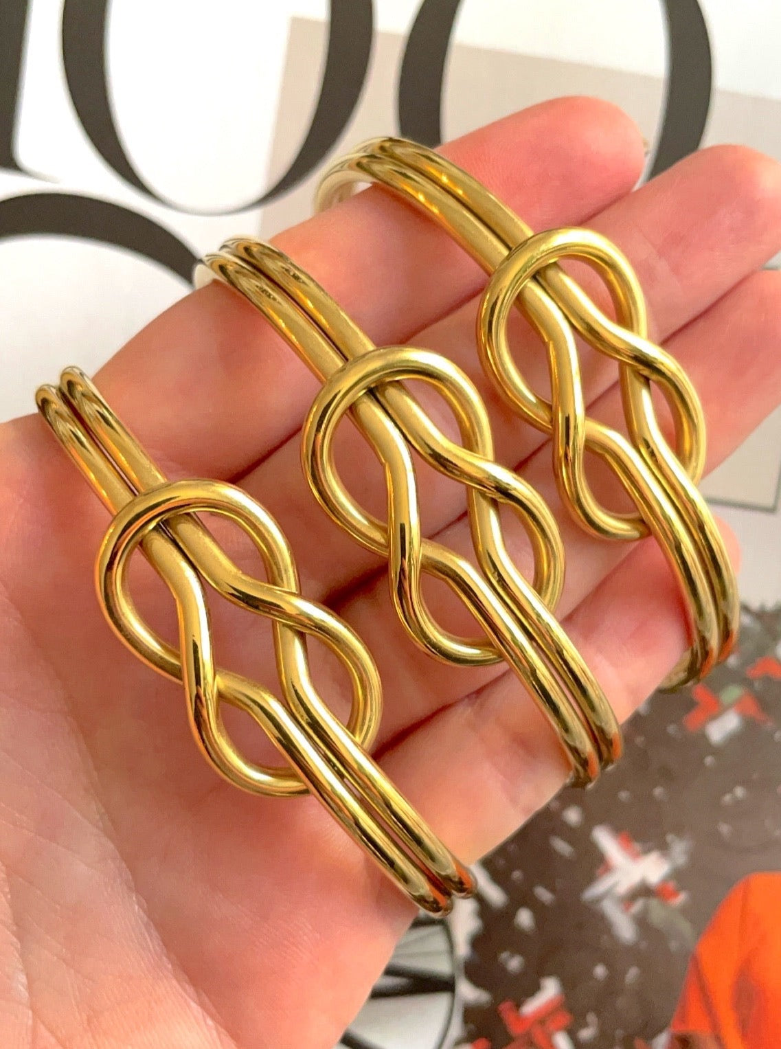 Golden knotted cuffs